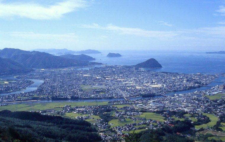 An aerial view of Hagi, a castle town on Yamaguchi's Sea of Japan coast, where a river meets the sea