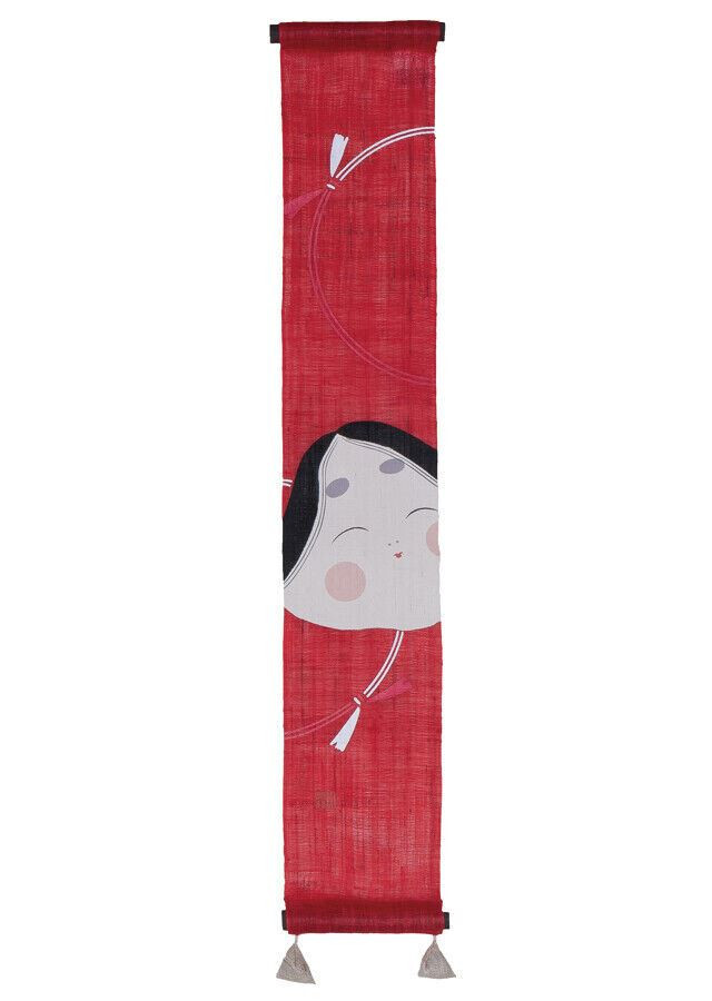 Red Kyoto linen tapestry wall hanging with a hand-painted face motif and tassels, minimalist Japanese decor.