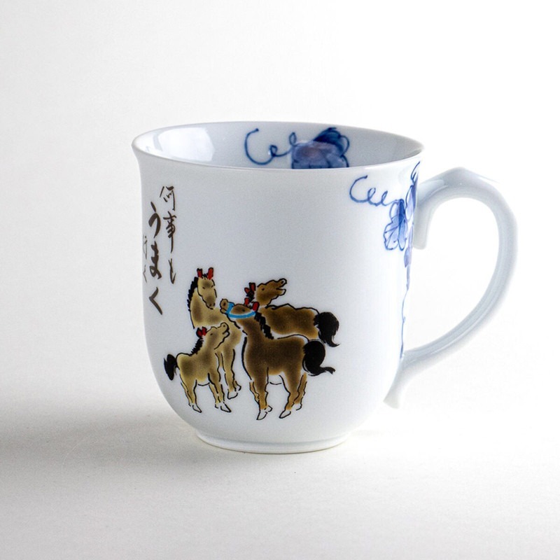 Porcelain mug with playful hand-painted horse motif