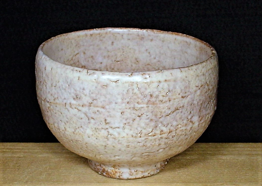 Hagi-yaki tea bowl with soft white glaze and visible craze lines